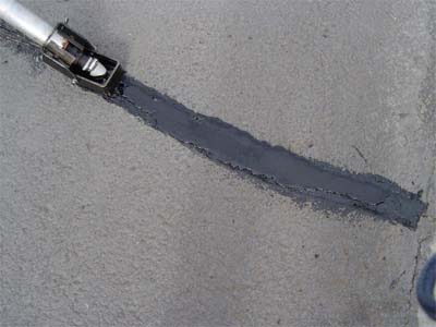 道路灌缝胶施工用灌缝机的封切式灌注